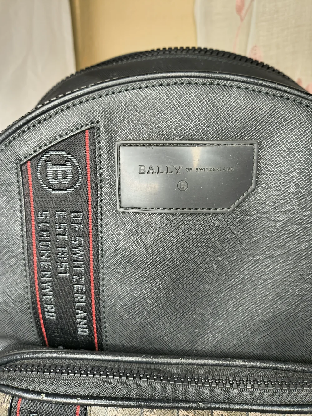 Bally Black leather backpack with brown monogram panel